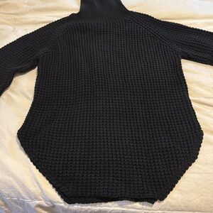 Oversized black turtleneck sweater